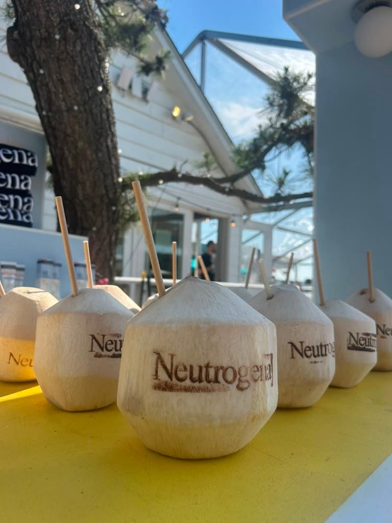 Neutrogena custom branded coconuts lined up at The Surf Lodge brand activation in Montauk
